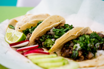 Three tacos on a tray